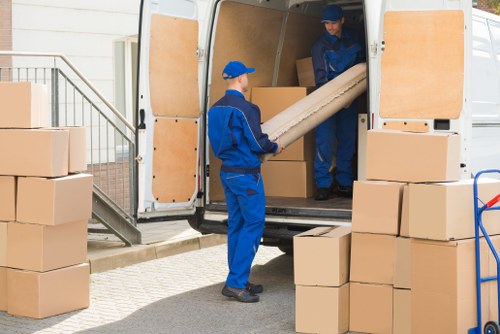 Man with van service moving boxes in Westkensington