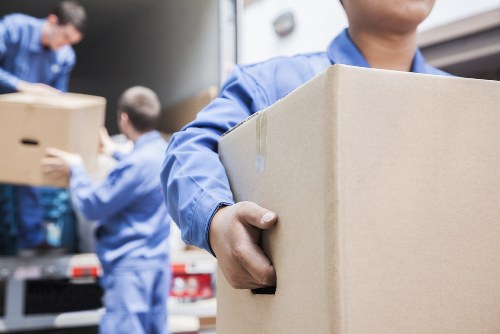 Removals van positioned for a flat move in West Kensington