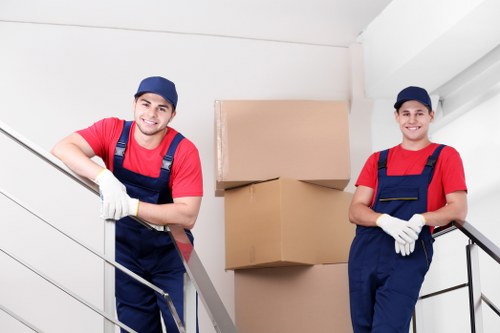 Moving boxes and furniture with a West Kensington removal van
