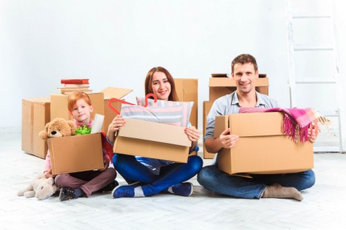 Moving team handling boxes in West Kensington