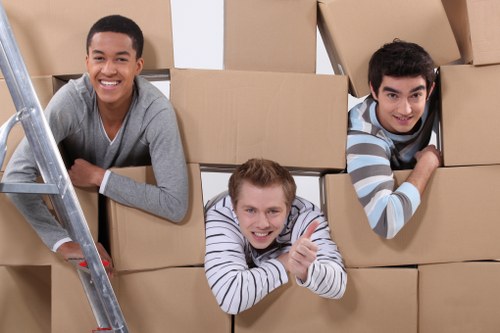 Loading furniture into a van near West Kensington streets
