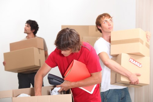 Packed boxes and furniture ready for a student move in West Kensington
