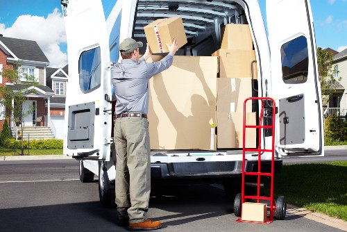 Household furniture being safely loaded by Westkensington removal experts
