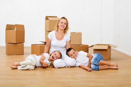 Packed moving boxes ready for urgent relocation in West Kensington