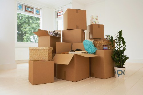 Sustainable moving team loading reusable boxes