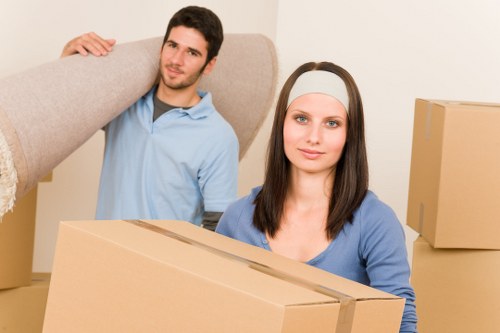 Moving team loading household items with attention and precision