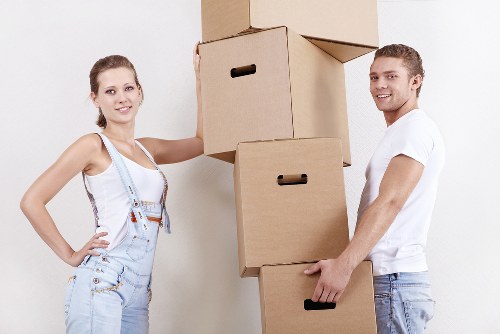 Furniture and boxes being loaded for a West Kensington relocation