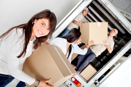 Loading a vehicle with secured items during a house move