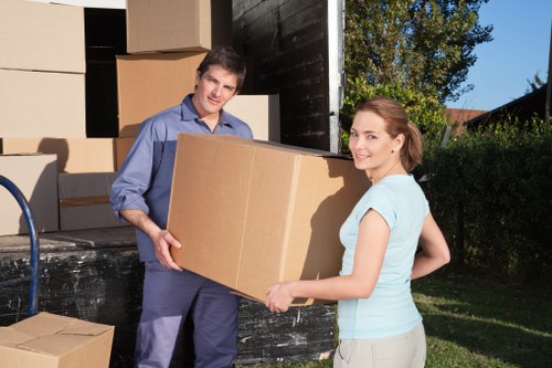 Warehouse items organized for transport during commercial moves in Westkensington